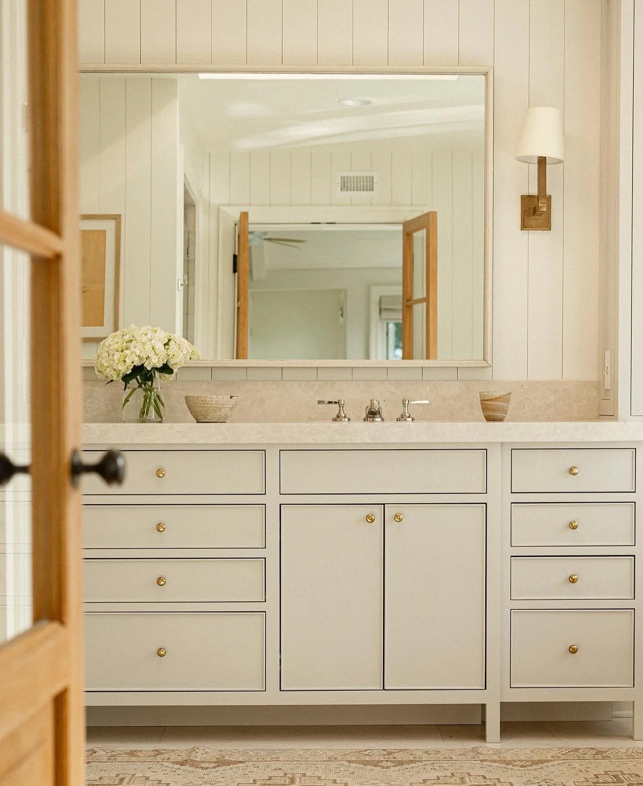 Design details from the en-suite primary bathroom at our Project Bentwood. We loved how much beautiful natural light this space got throughout the day &mdash; always a big plus in our books when it comes to nailing the layout of bathrooms. 

Photogra