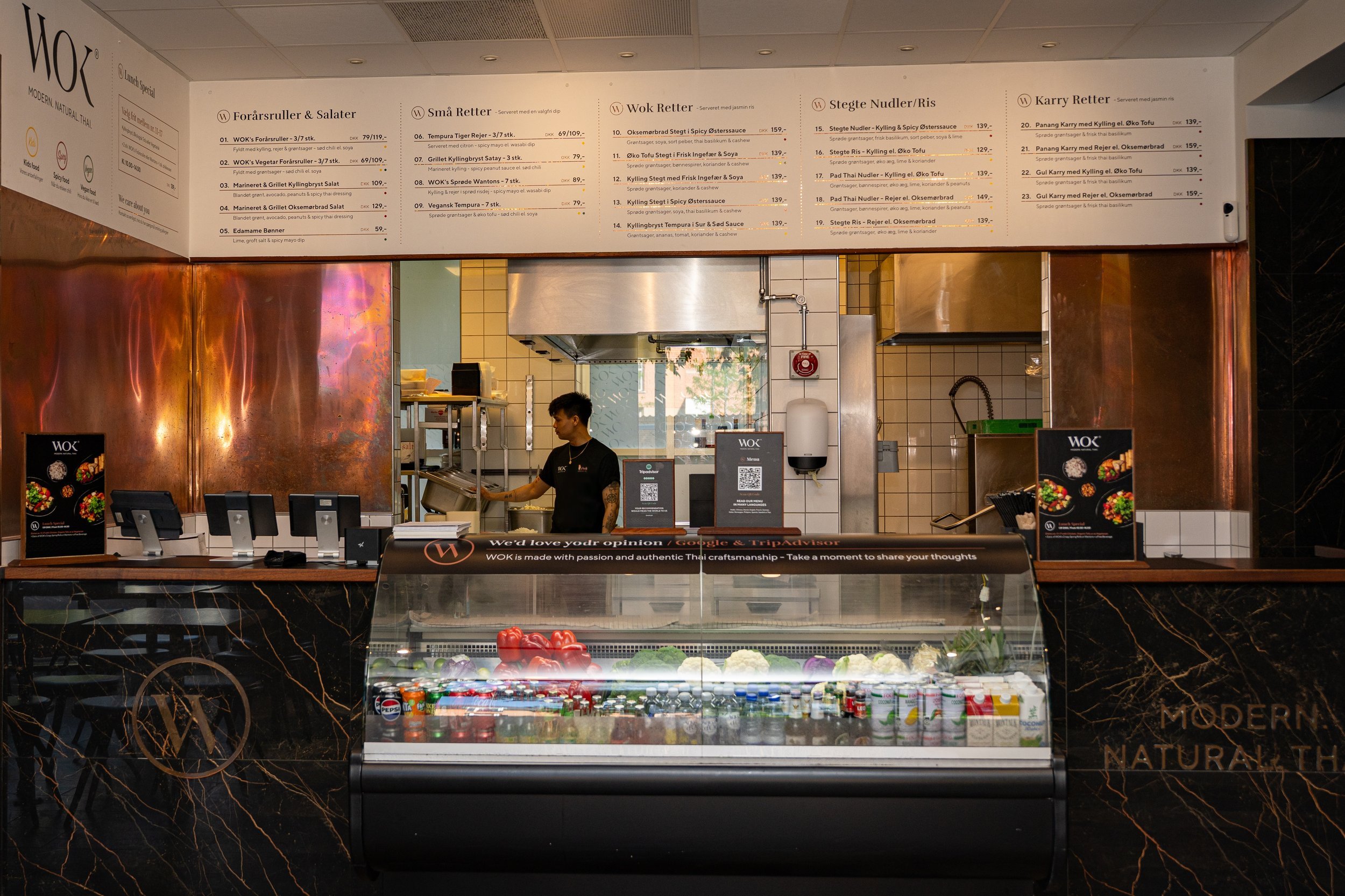 WOK Copenhagen counter with menu boards and open kitchen – restaurant interior photography by Monday's Photo