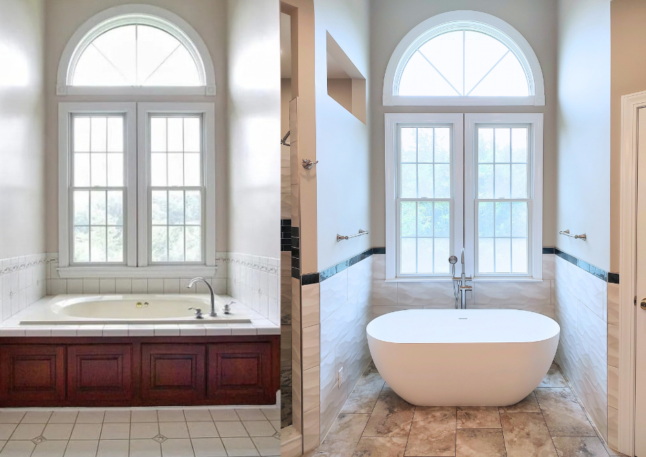 Freestanding soaking tub beside a window overlooking the landscape in a Riner bathroom.
