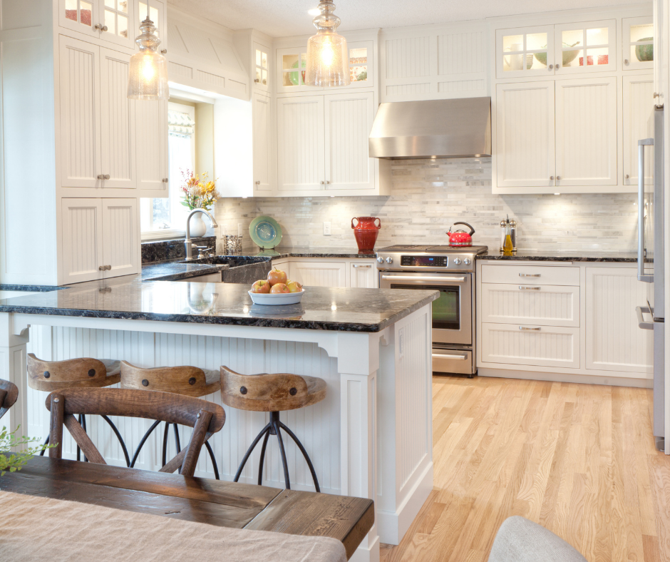 Open-concept kitchen with tall white cabinets and tile backsplash