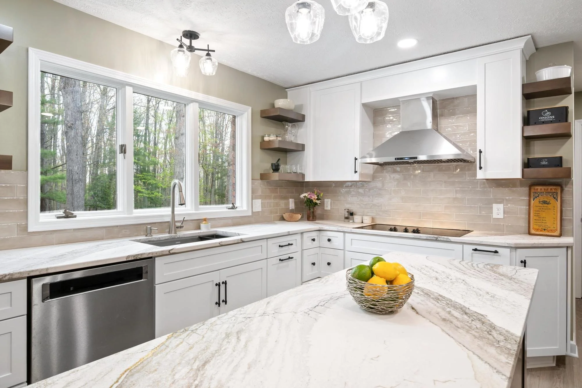Blacksburg kitchen remodel with white cabinetry, quartz countertops and a large center island