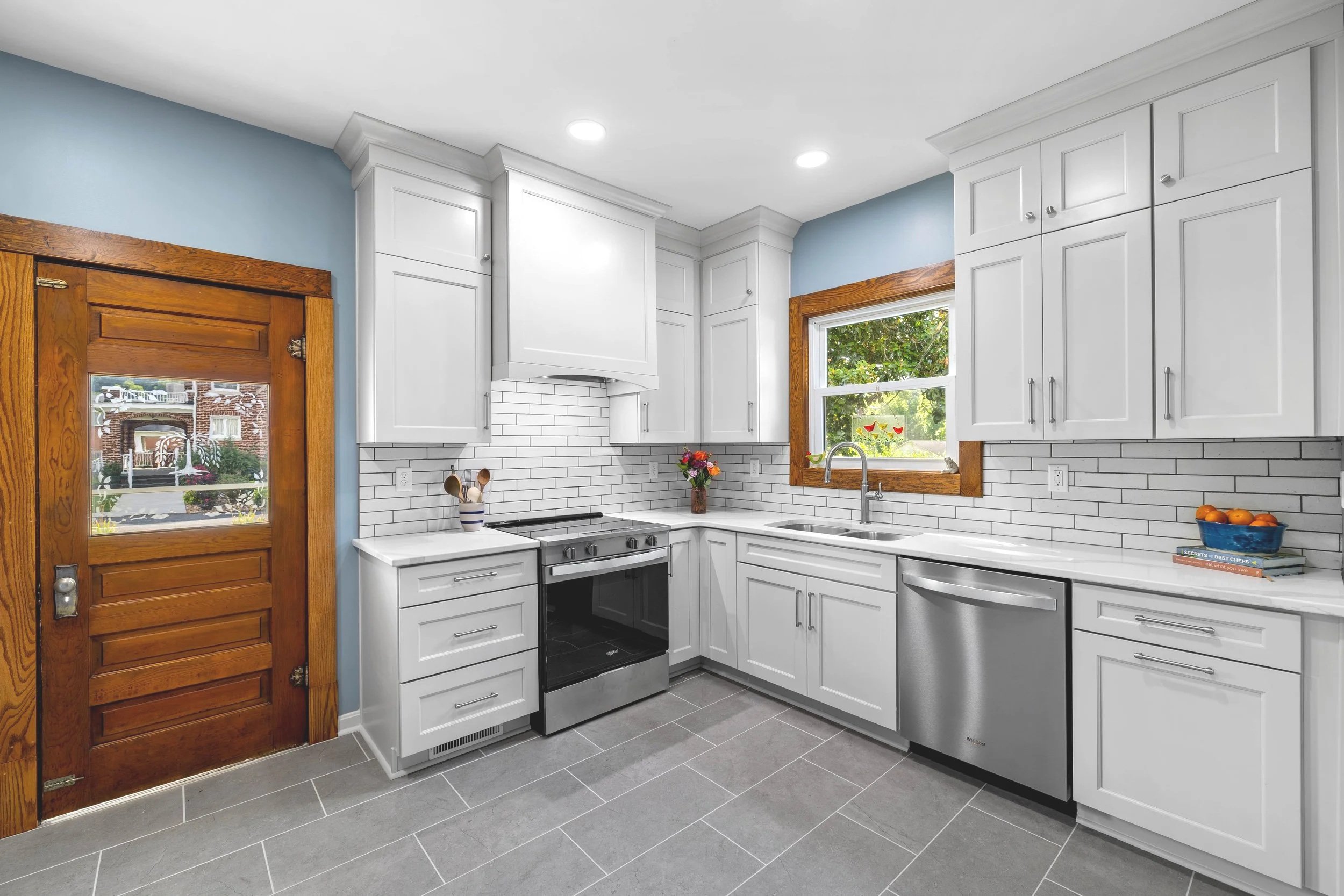 Historic Pembroke kitchen remodel with light cabinetry, custom storage and updated finishes