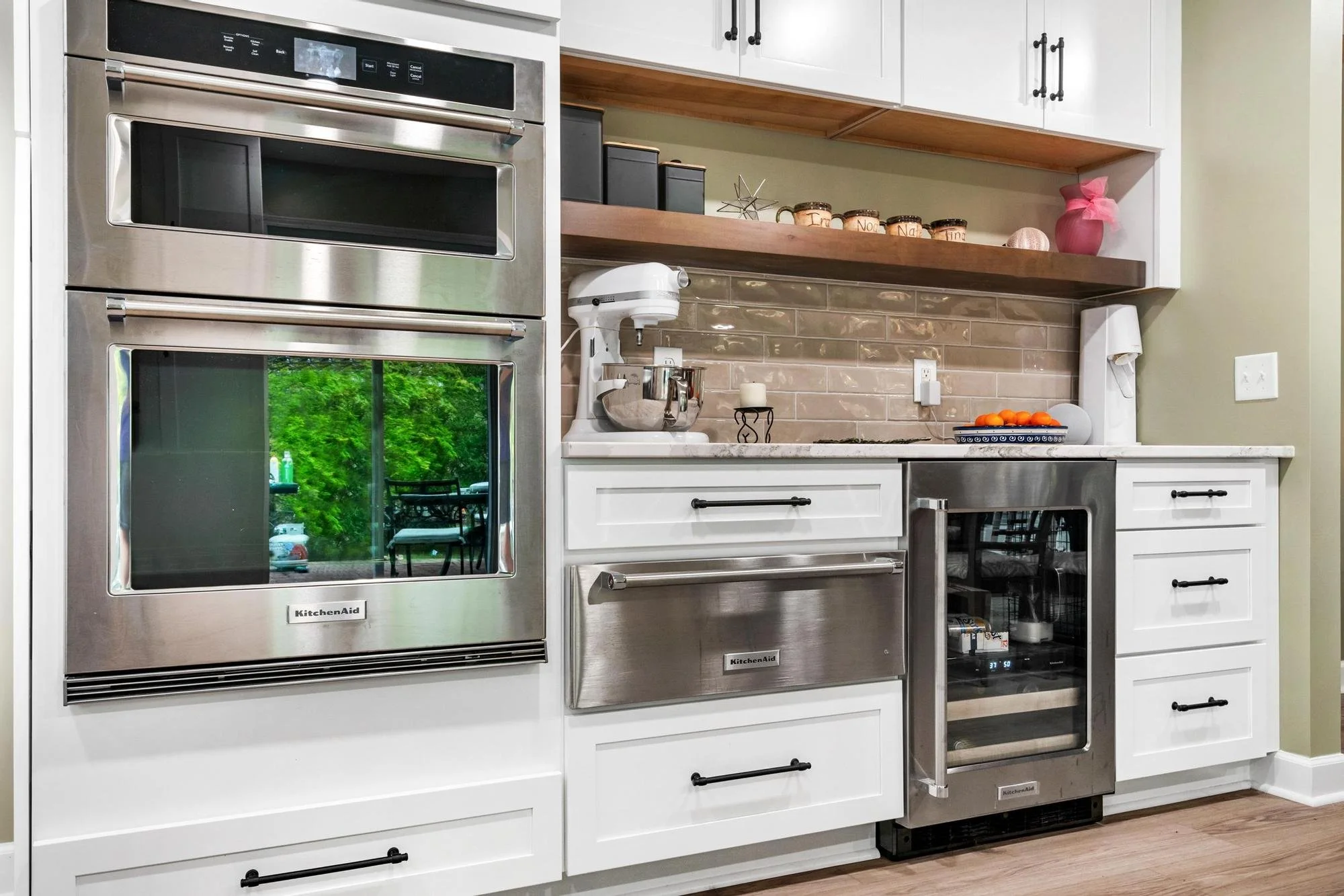 Kitchen remodel in Preston Forest Blacksburg VA featuring custom cabinetry, coffee bar, double ovens, and modern finishes by Renovations & Dependable Building