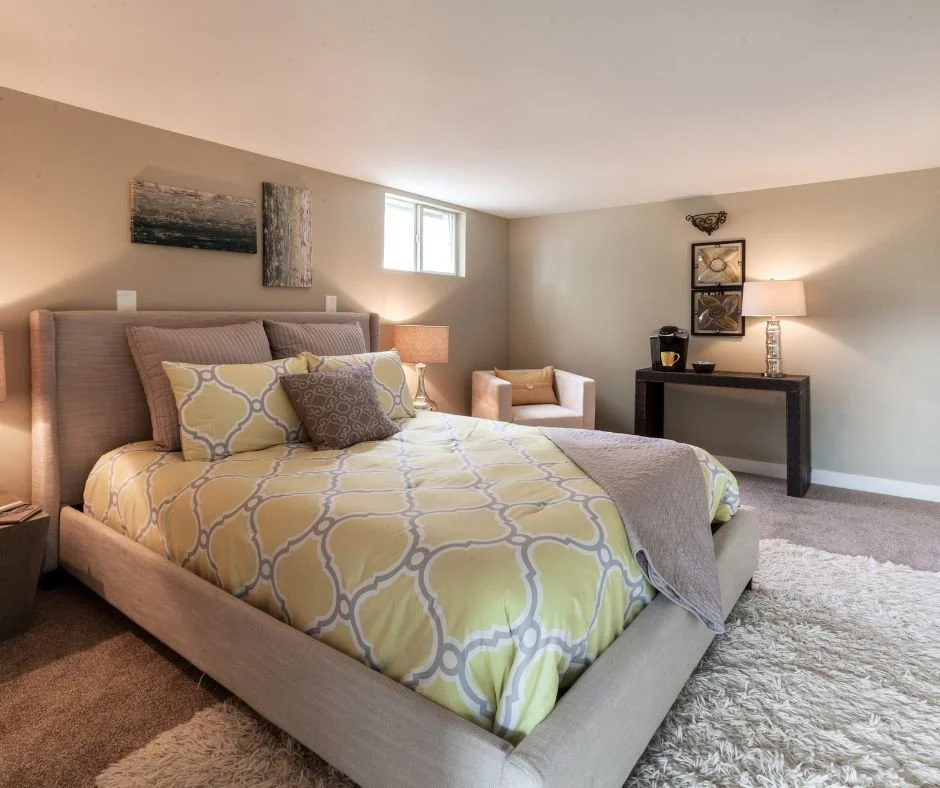 Finished basement guest space with room for overnight visitors and comfortable seating