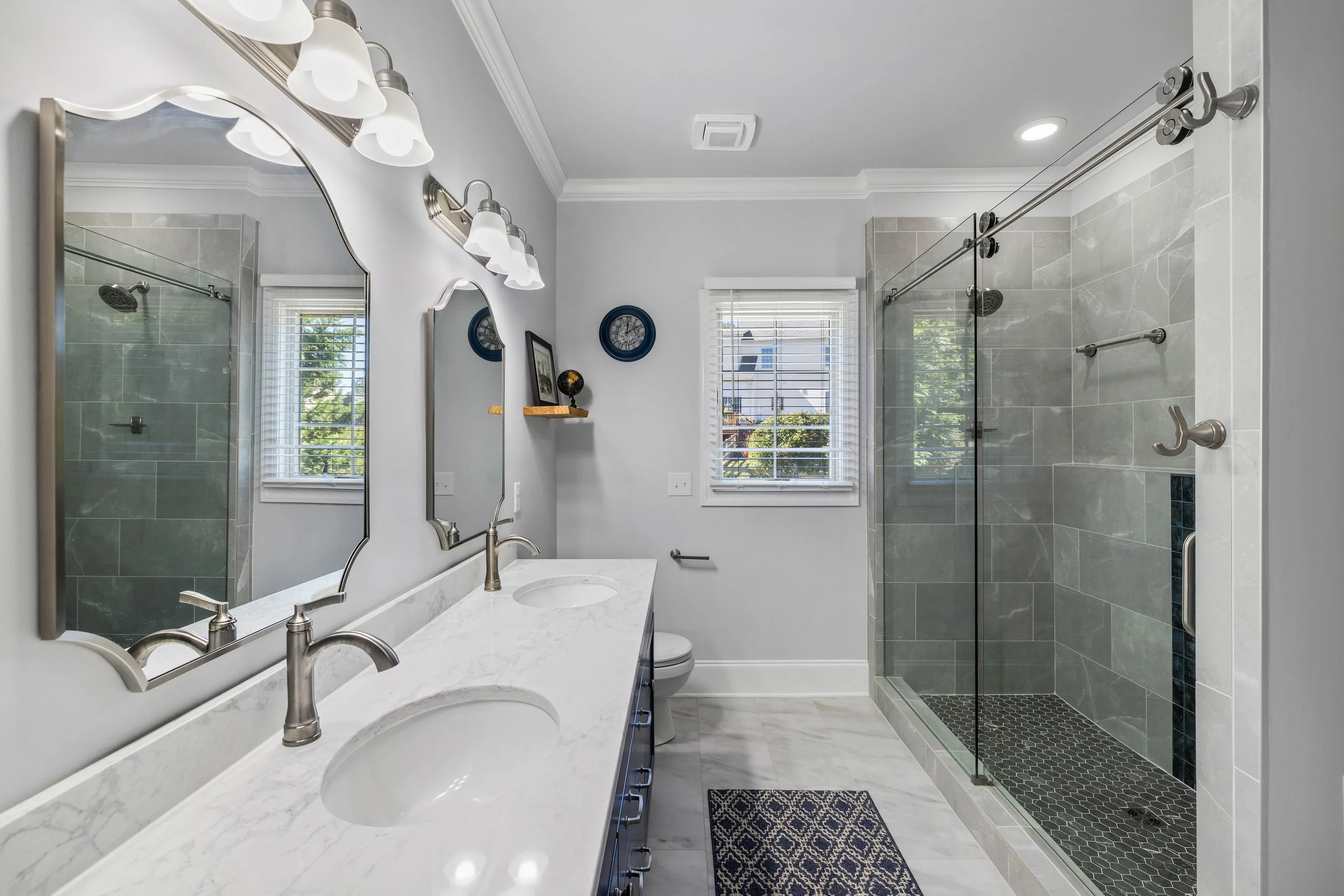 Master bathroom with double sinks and walkin shower