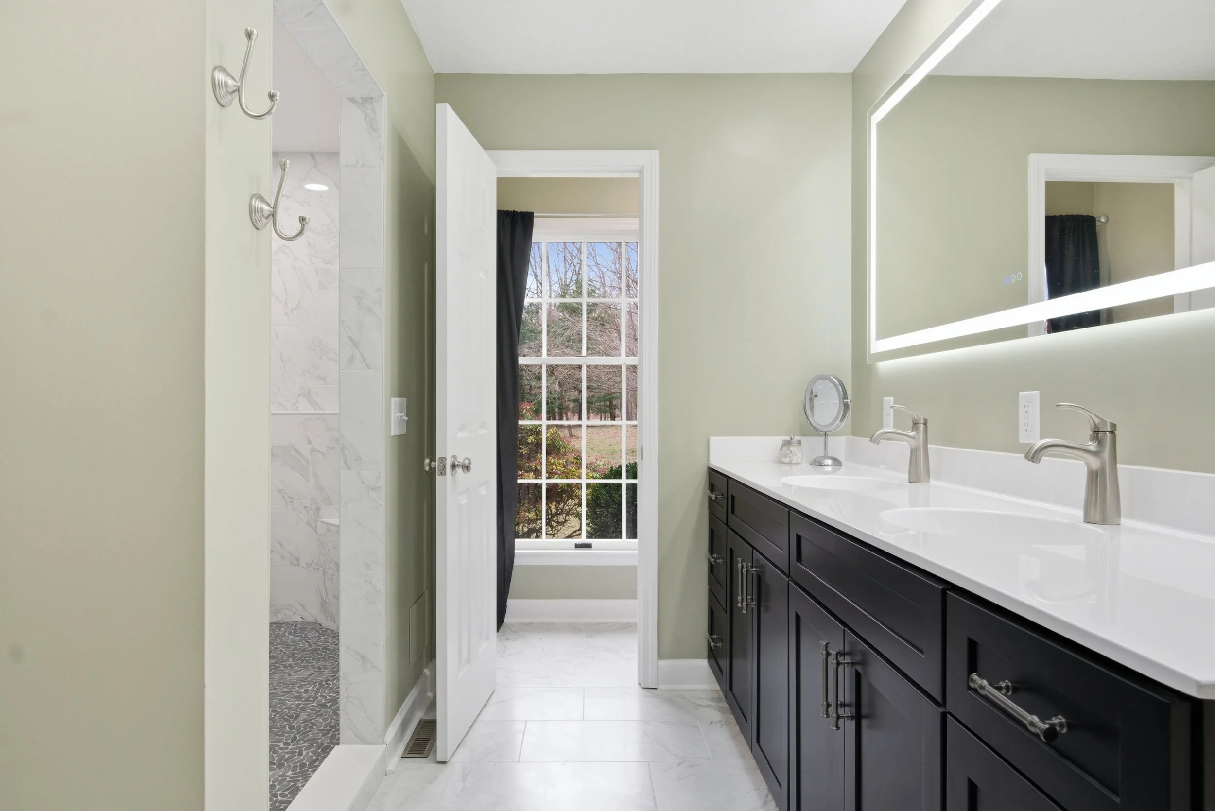 Remodeled primary bathroom in Blacksburg, Virginia with custom finishes and updated fixtures