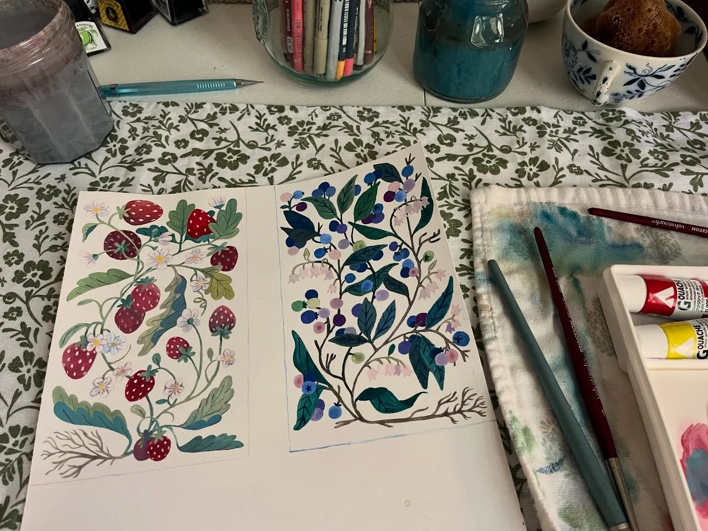 working on some business card designs since I haven&rsquo;t updated mine in several years&hellip;. which do we like better? strawberries 🍓 or blueberries? 🫐