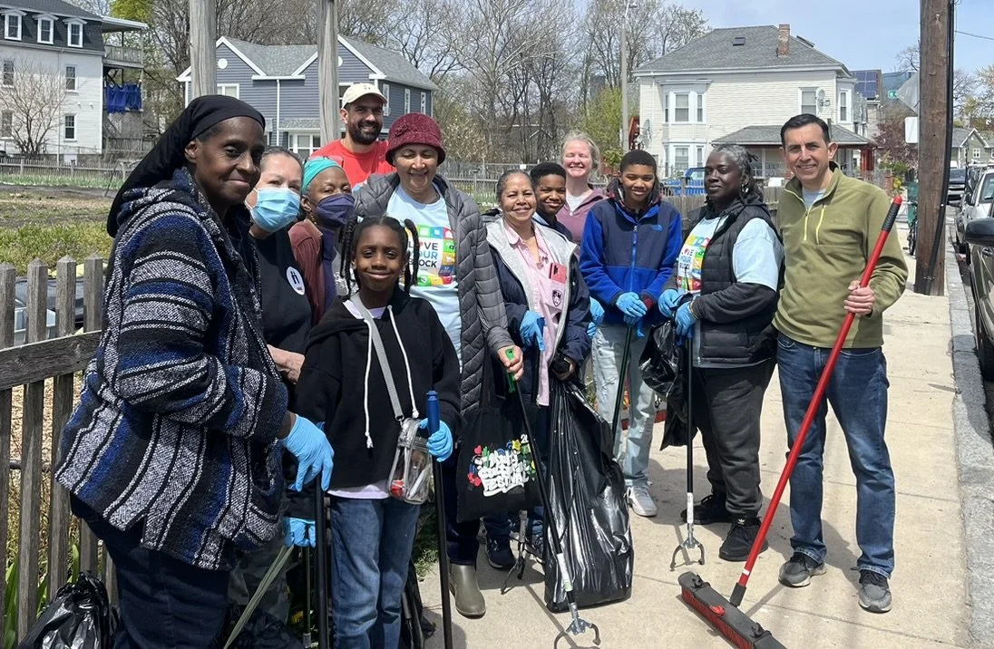 Samuel Hurtado volunteering with a group to clean the streets of Boston's District7