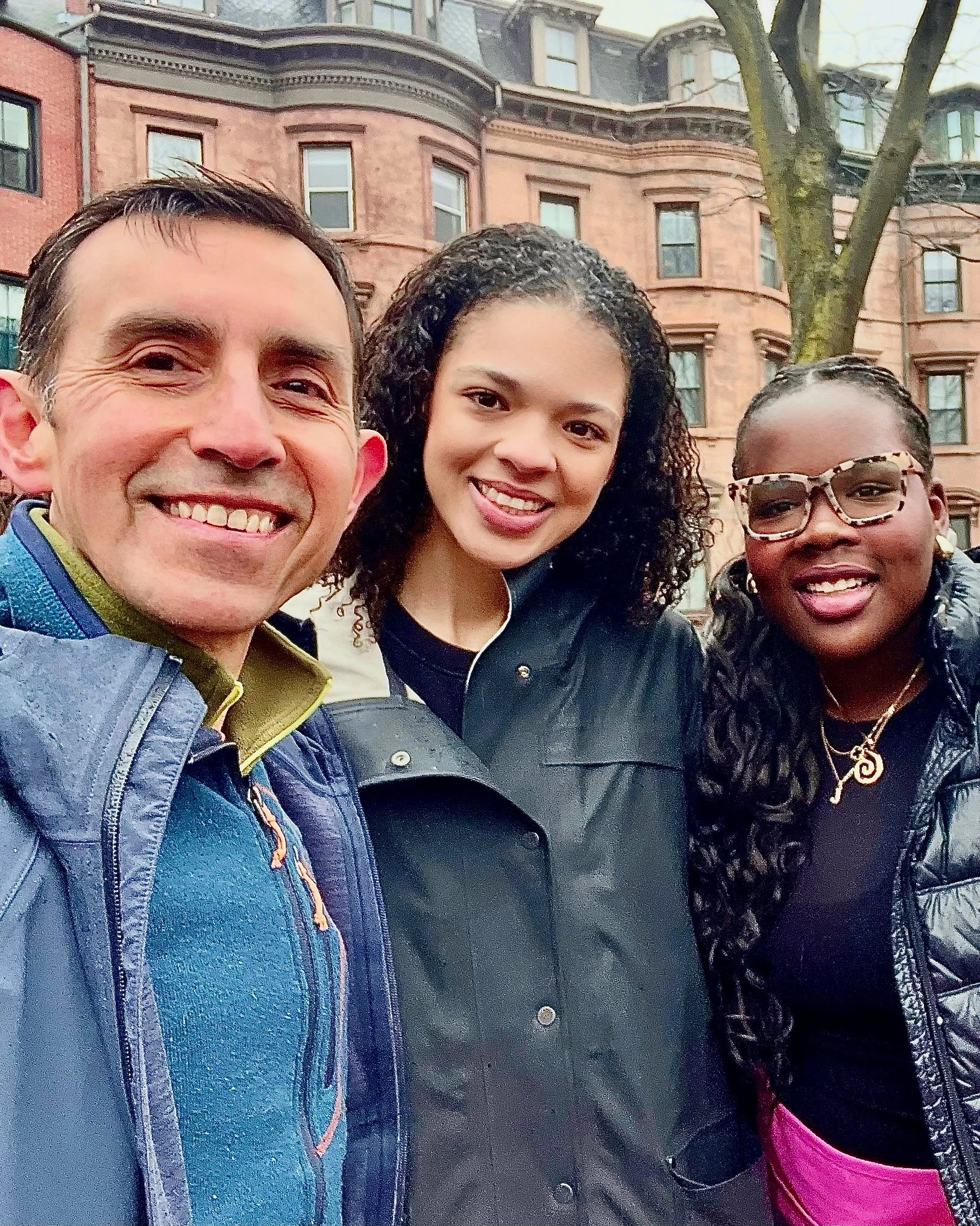 Samuel Hurtado with two young adults from Boston's District 7.