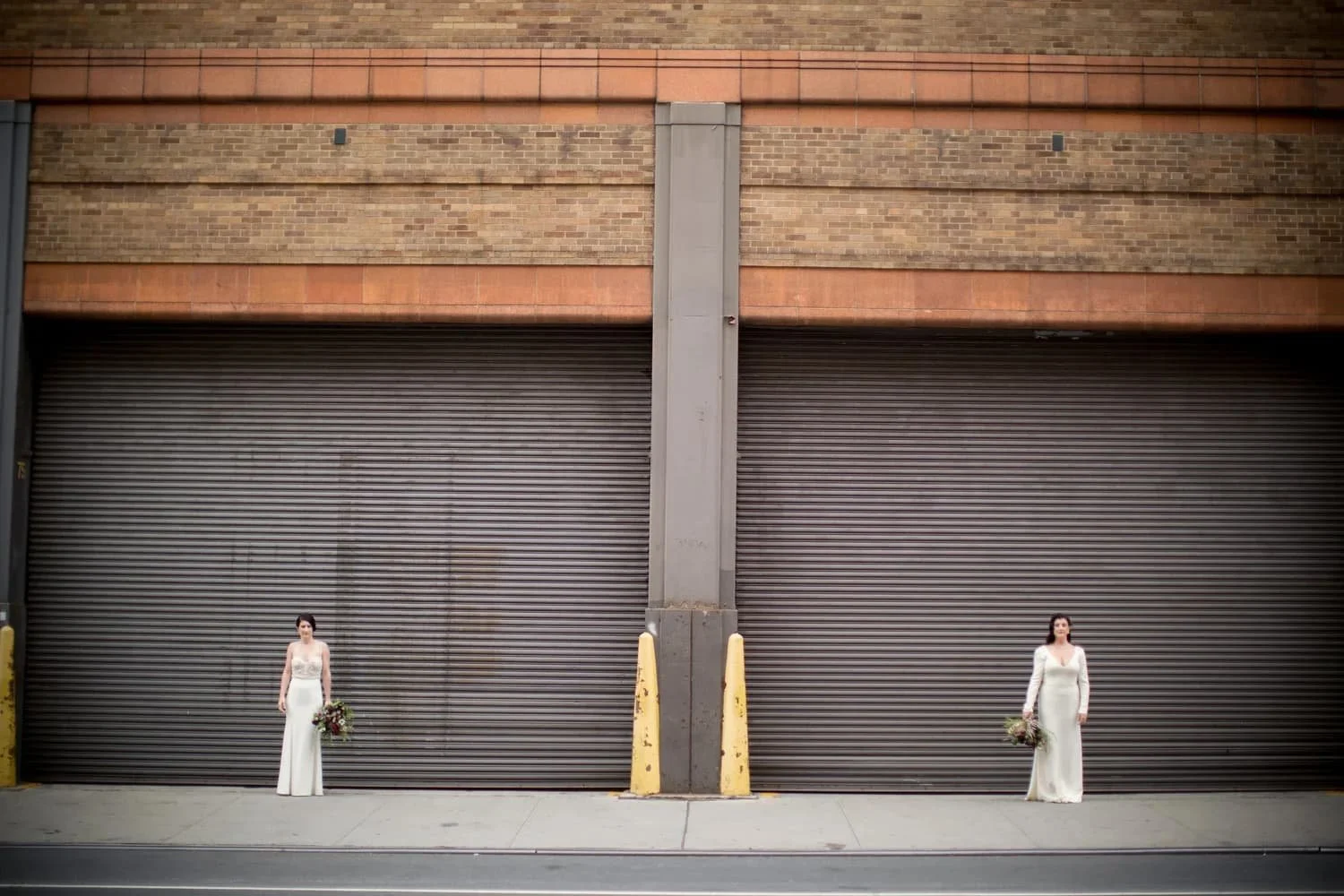 Two women in white wedding dresses in New York City, representing LGBTQ+ relationships and affirming therapy support