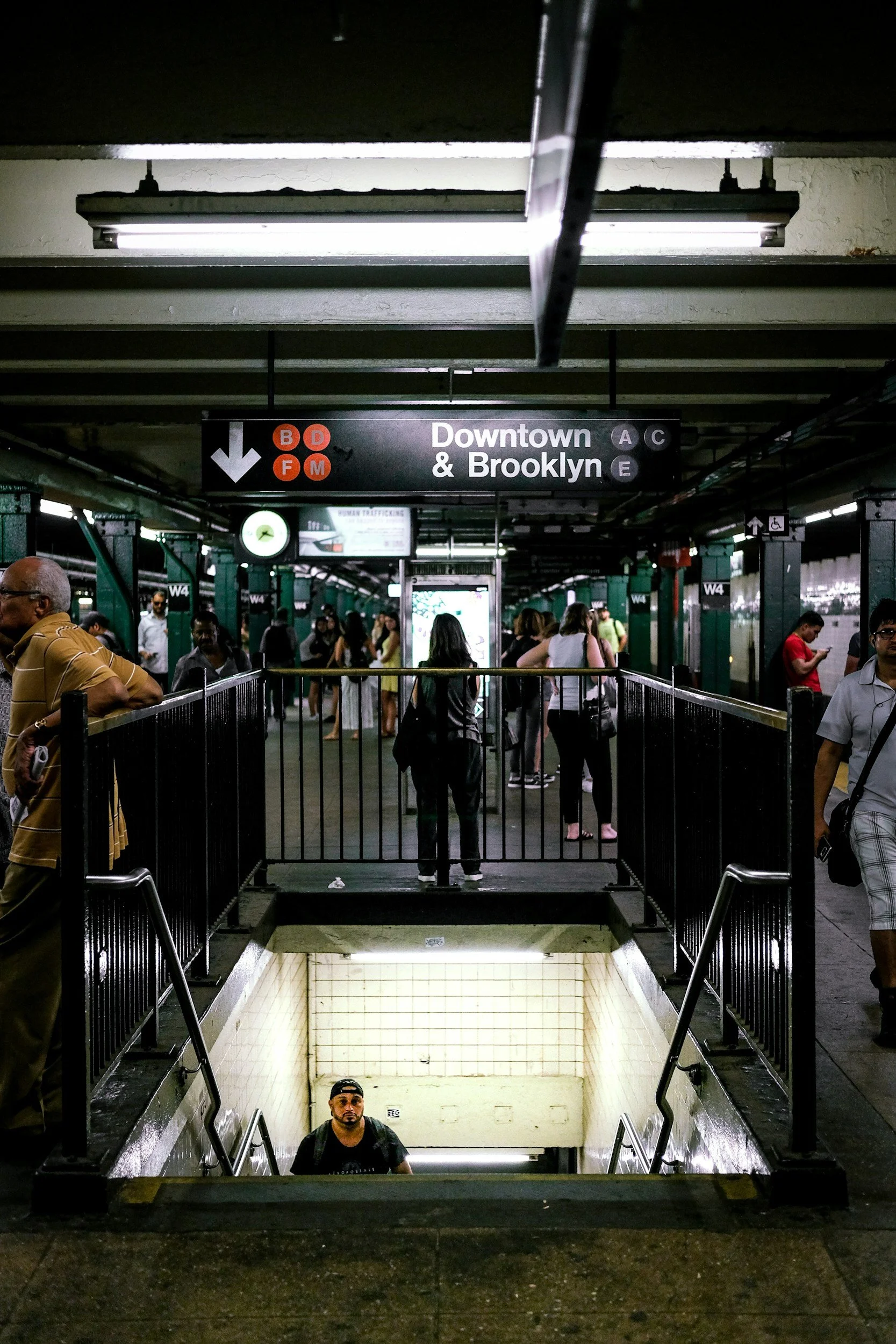Brooklyn subway station with passengers in New York City