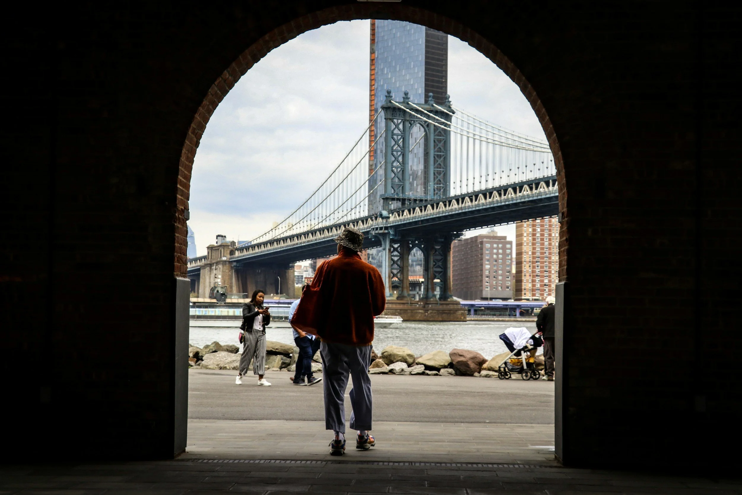 Person walking in Brooklyn city reflecting on life direction, self acceptance, and feeling behind in life