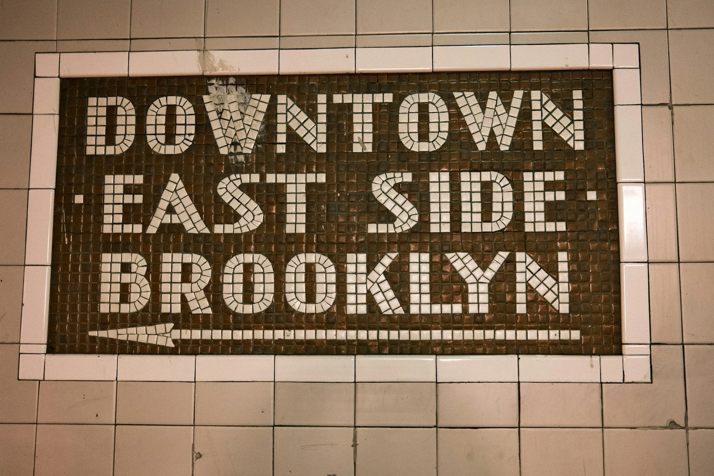 Brooklyn subway sign representing moving anxiety, life transitions, and adjustment to a new city