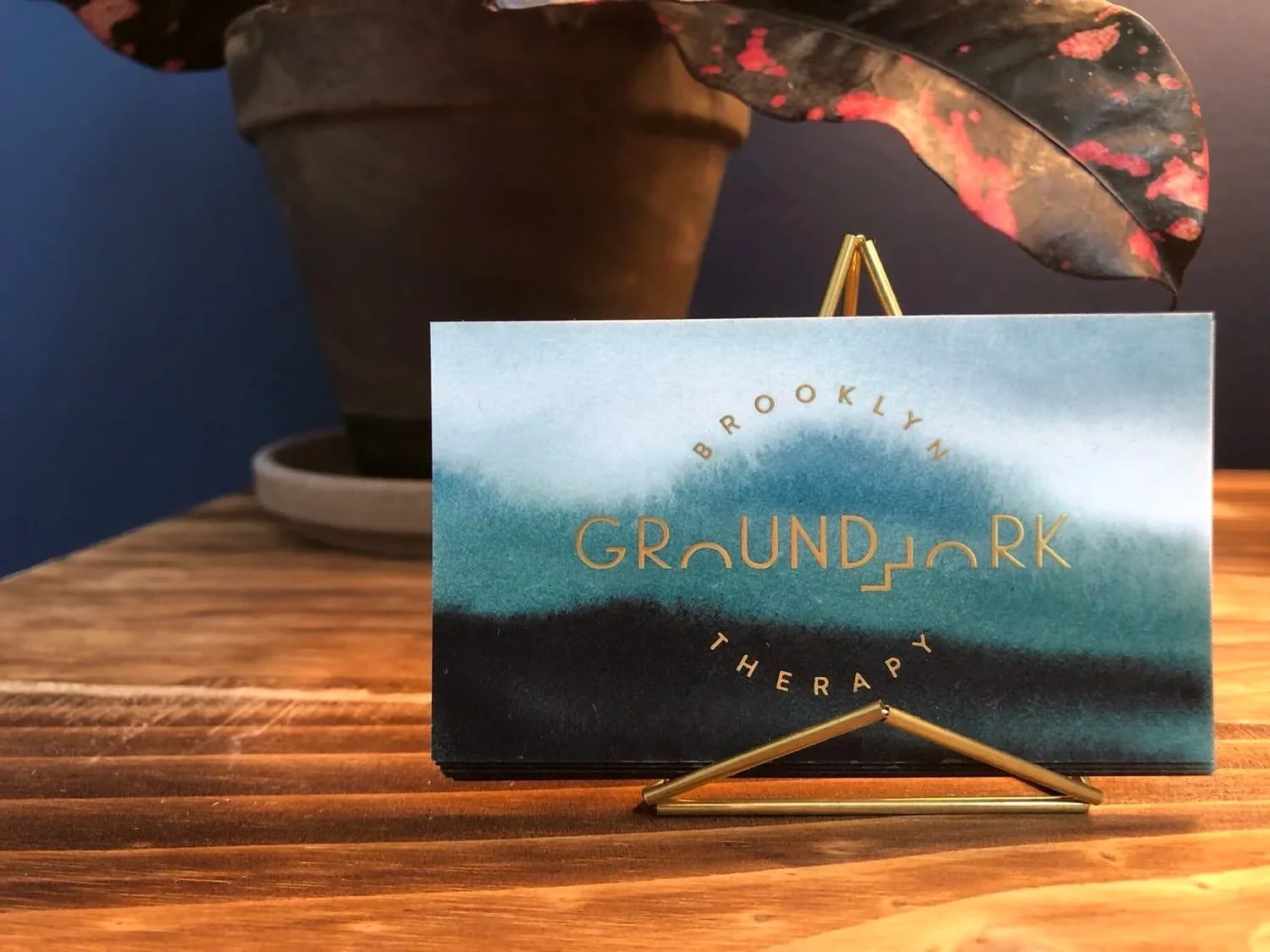 Groundwork Therapy business card on an office desk
