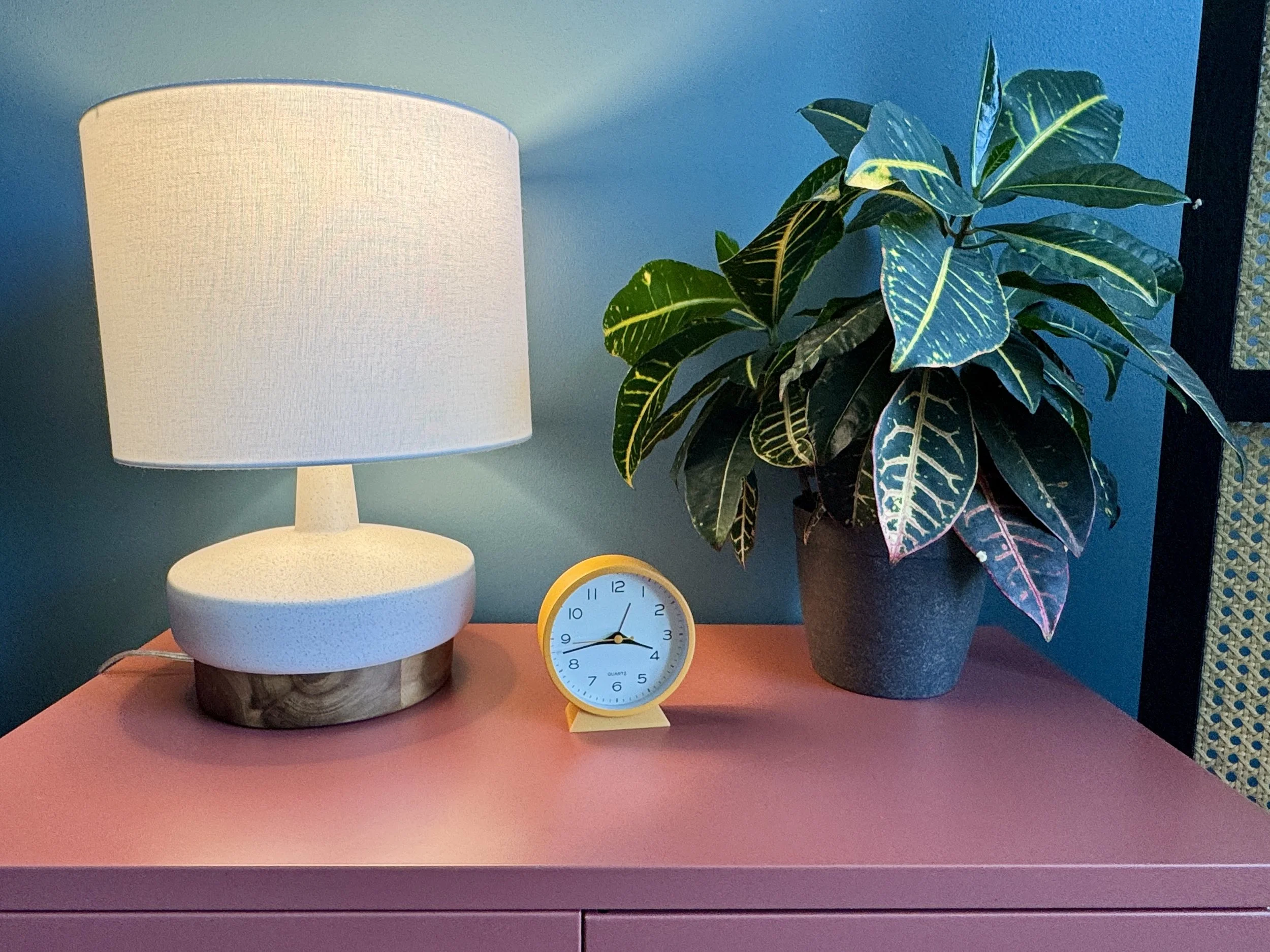 Plant, clock, and lamp in a Groundwork Therapy office in Brooklyn