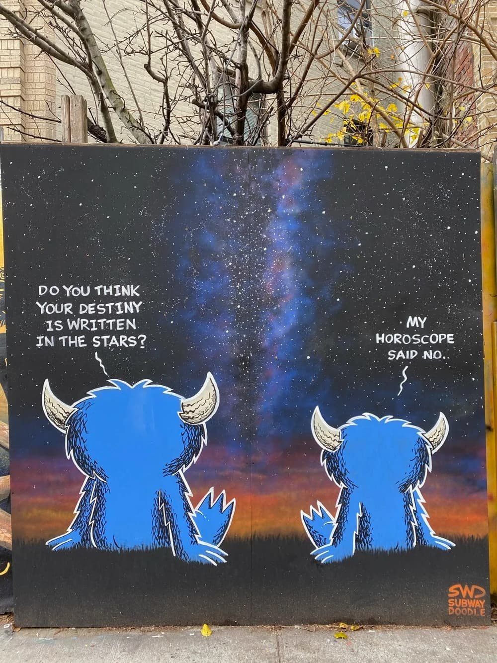 Cartoon artwork displayed on a wall in the Prospect Heights neighborhood near therapy office