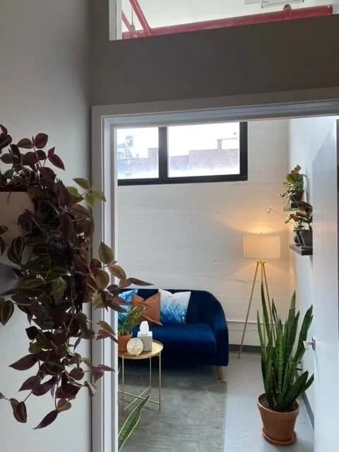 Comfortable couch in a private therapy office at Groundwork Therapy Brooklyn, where therapy unfolds through conversation, reflection, and understanding.
