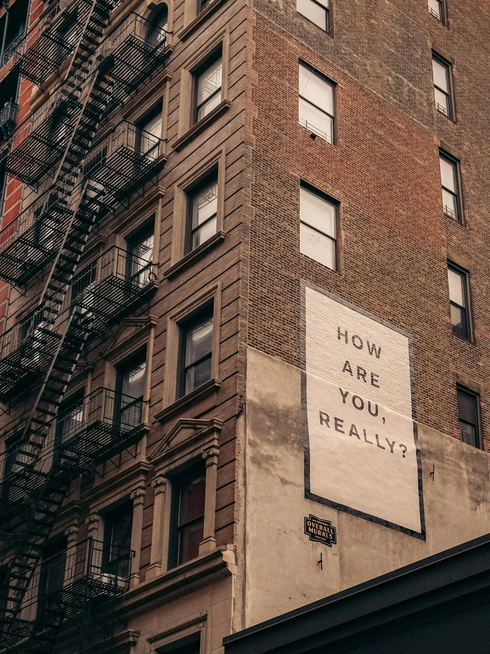 Wall sign reading 'How are you, really?' featured on a teen therapy page.