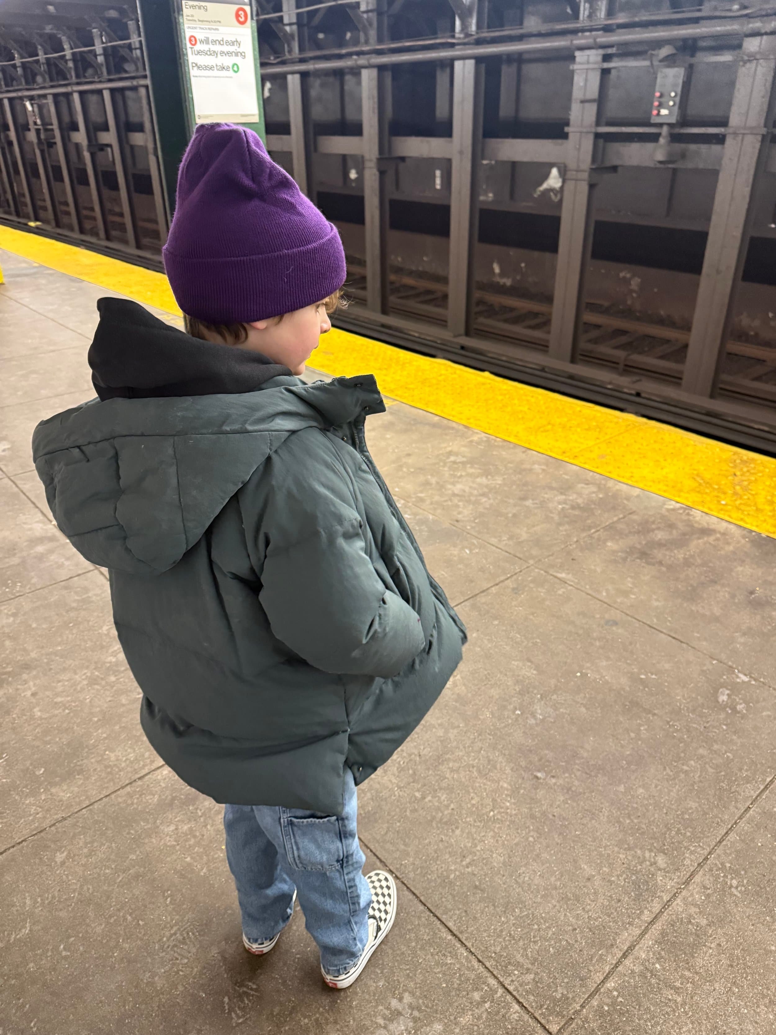 Child in Brooklyn waiting for the subway