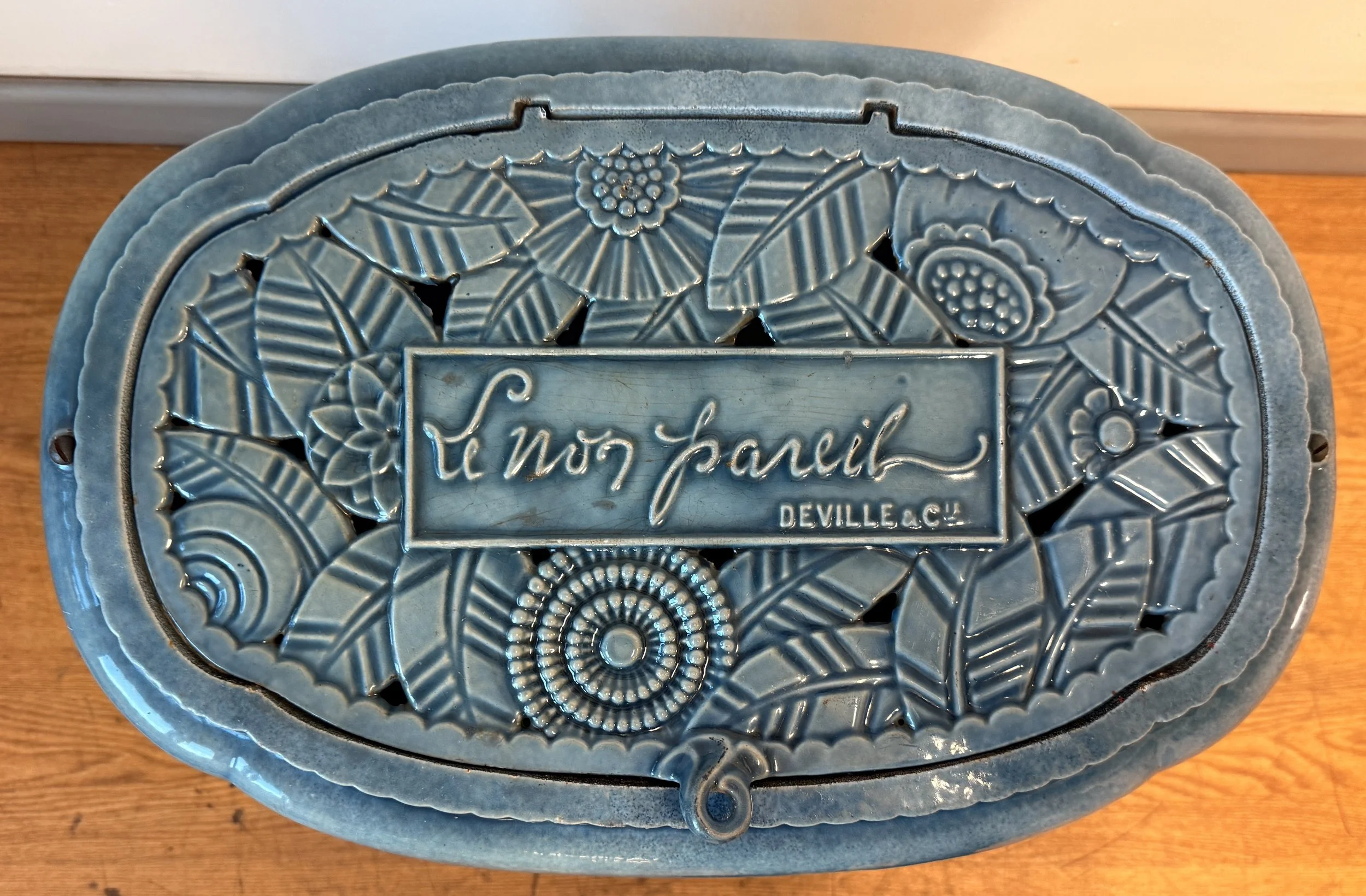 Arts and Crafts lid on vintage stove