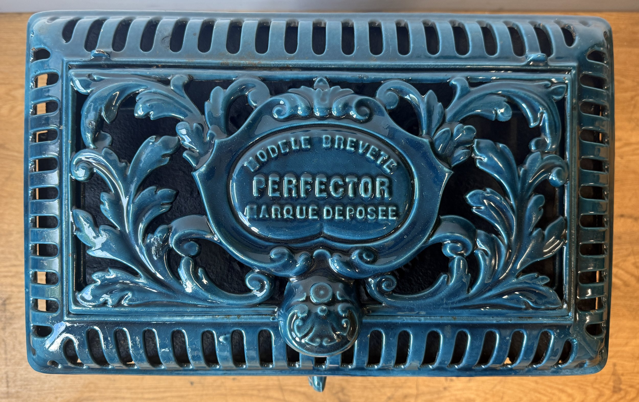 Foliate design on the lid of a French Antique Fire