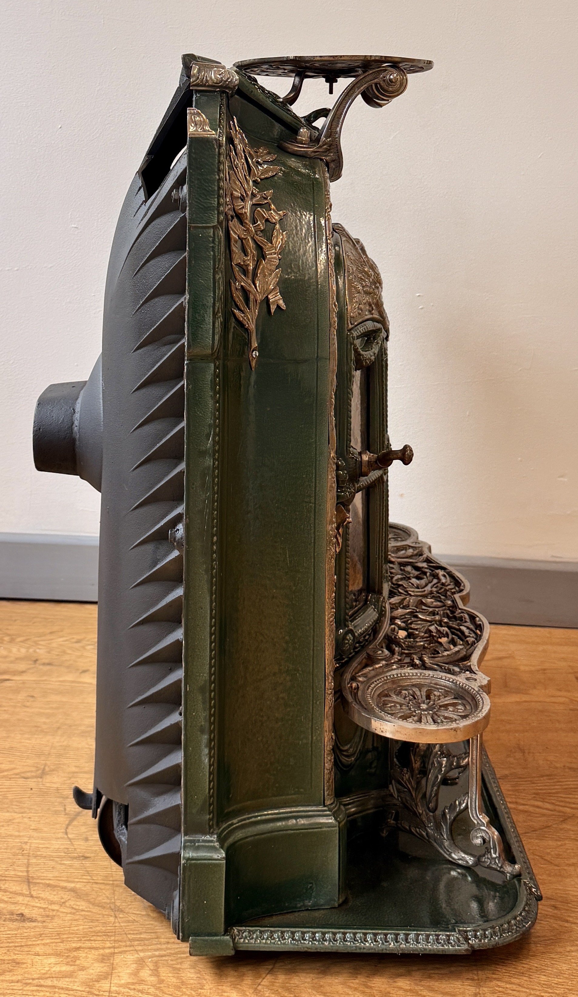 View from the side of an ornate French stove