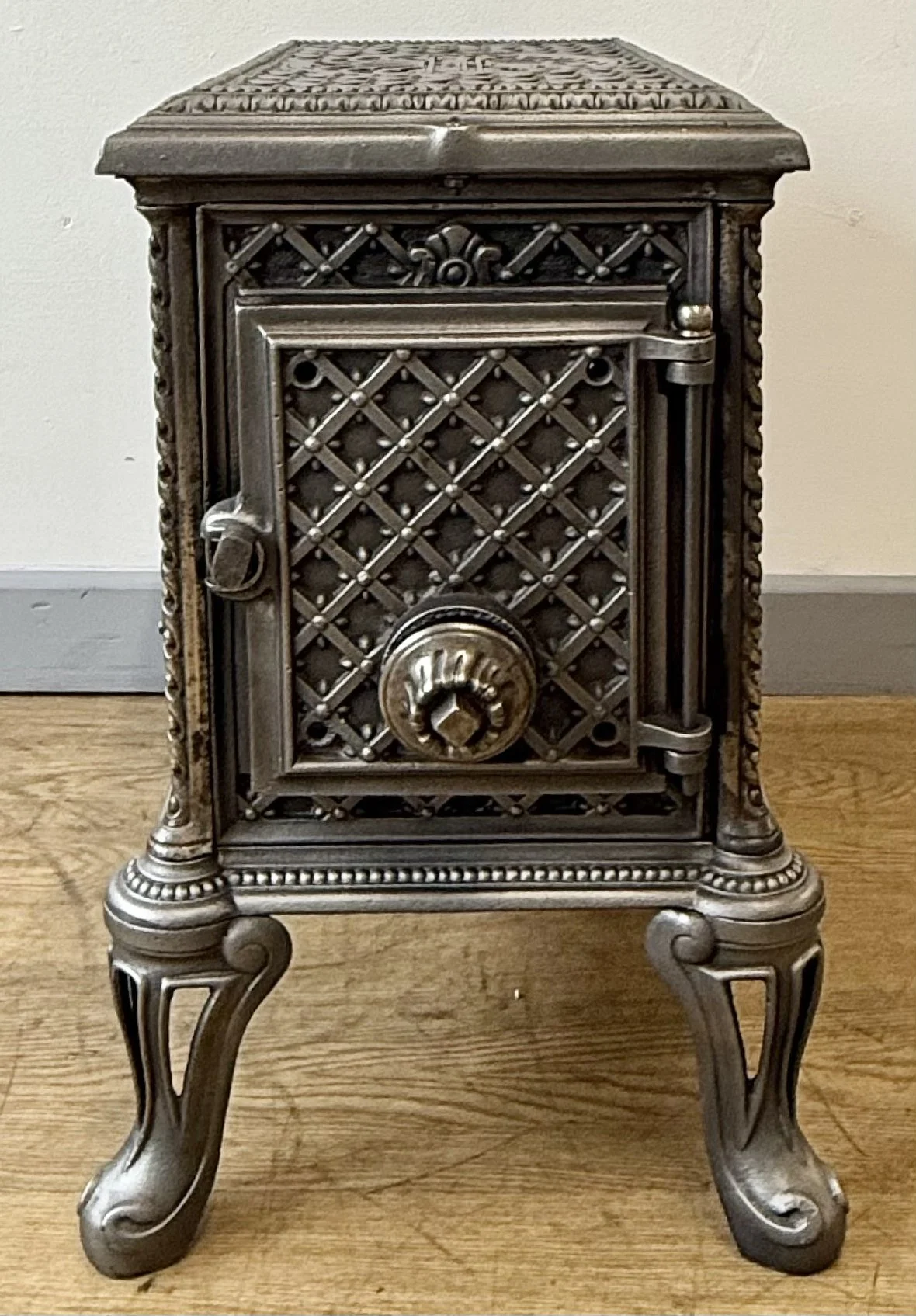 SIde view with door of Antique French Stove
