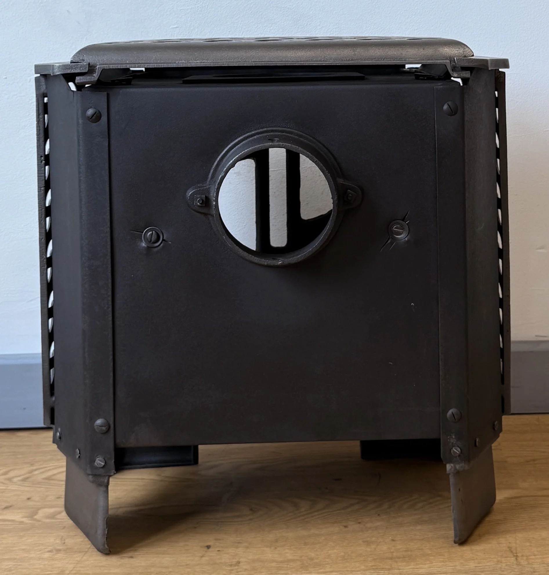 Rear view of cast iron stove
