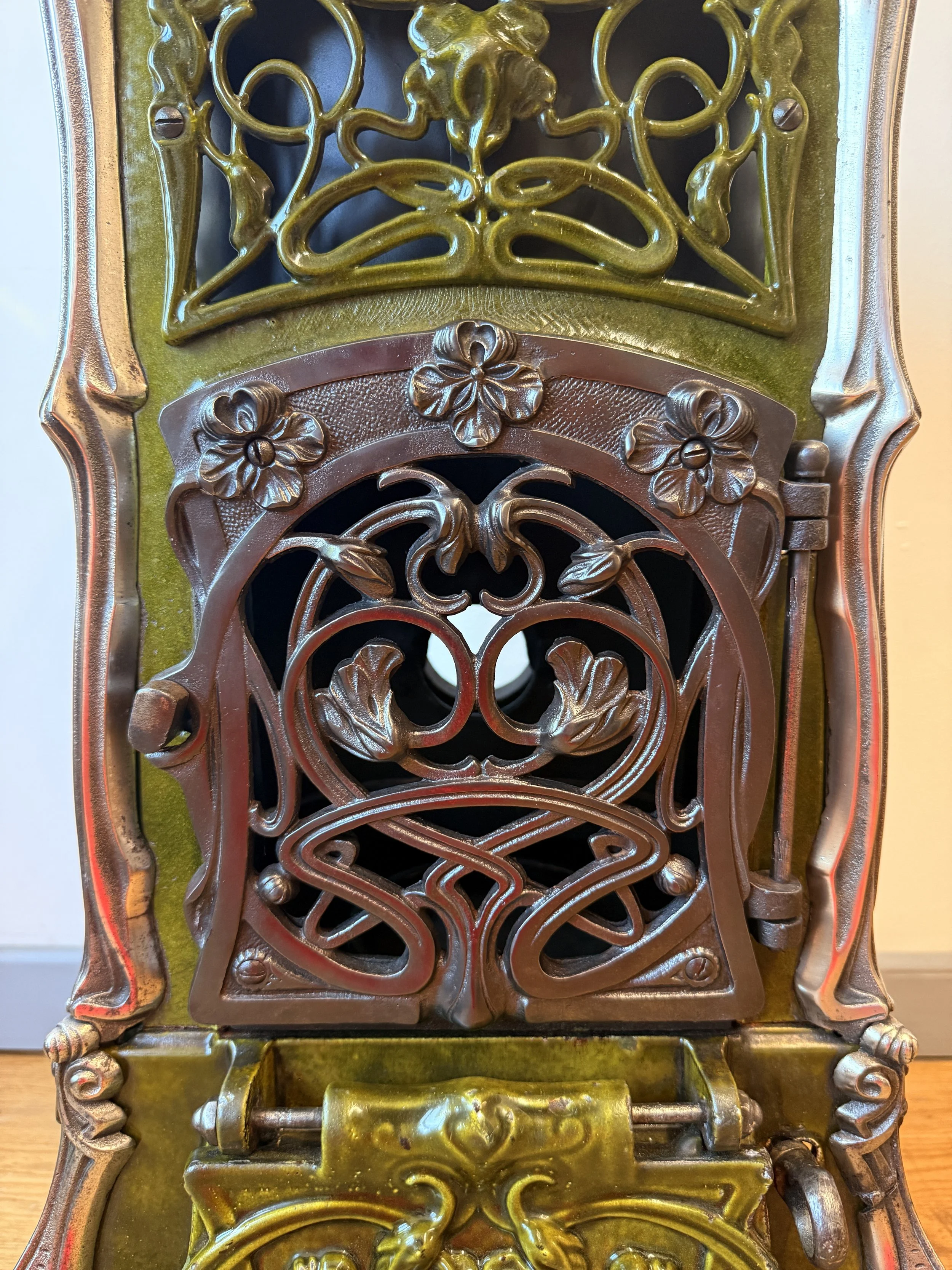Cast iron stove door showing amazing detail