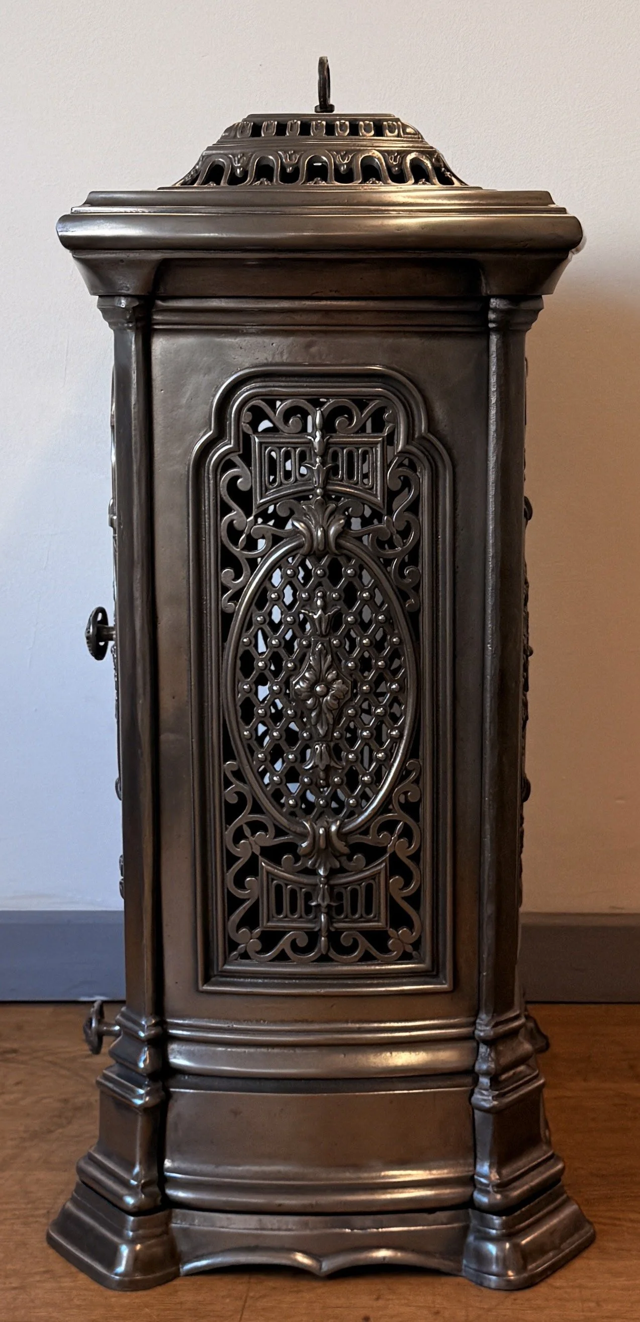 Side view of a tall French stove