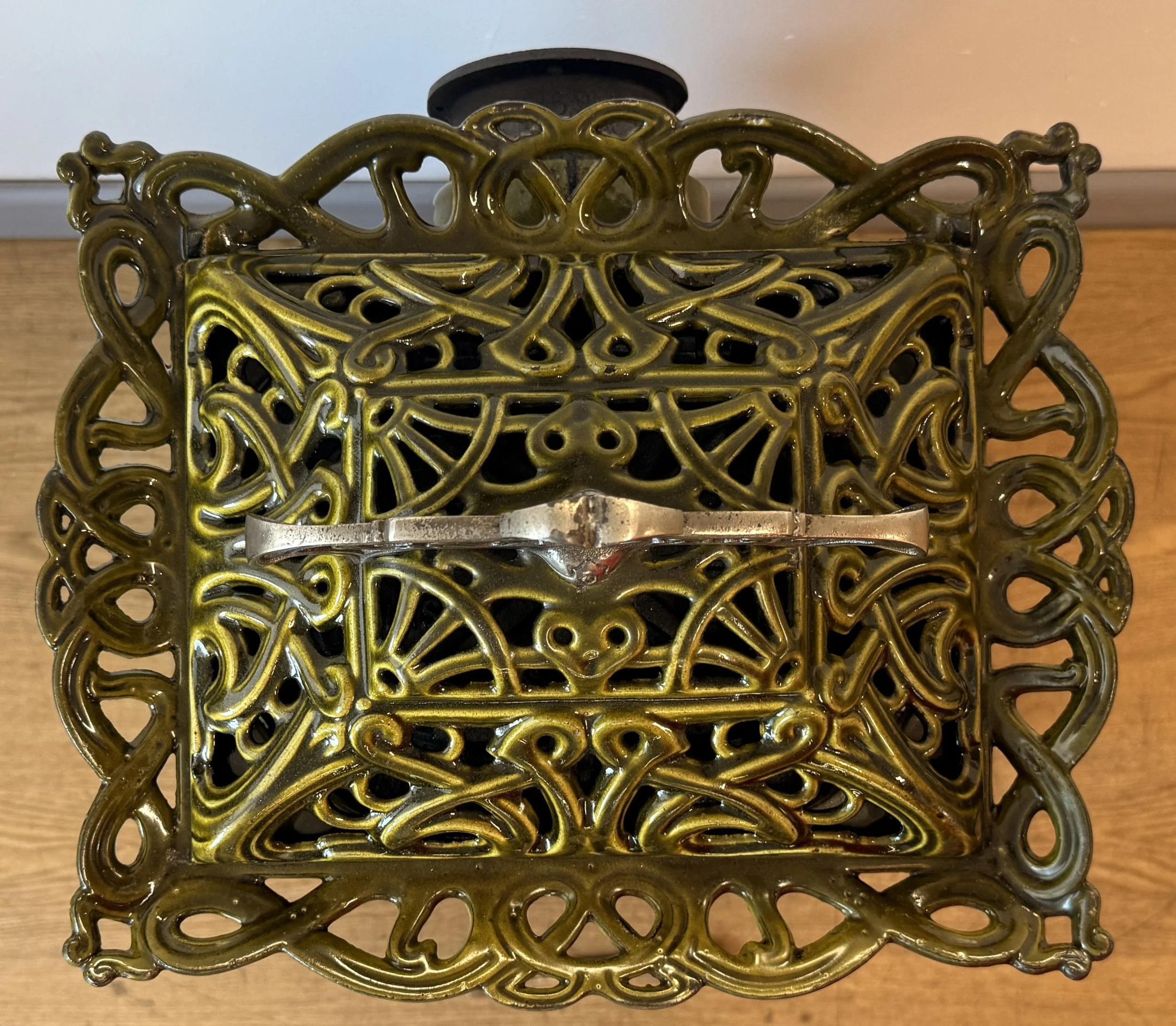 Intricate detail of lid on vintage stove