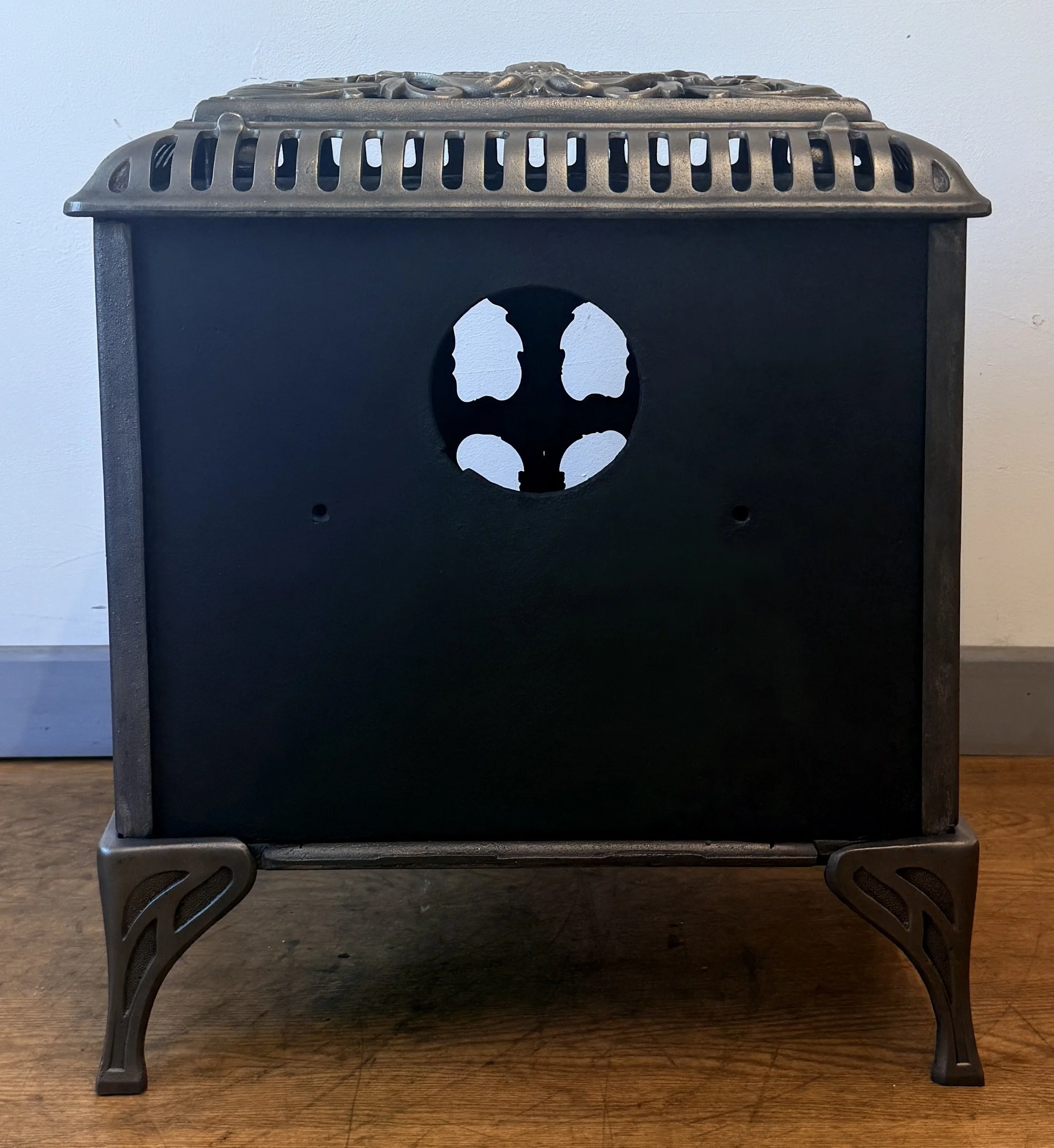 Rear view of cast iron stove