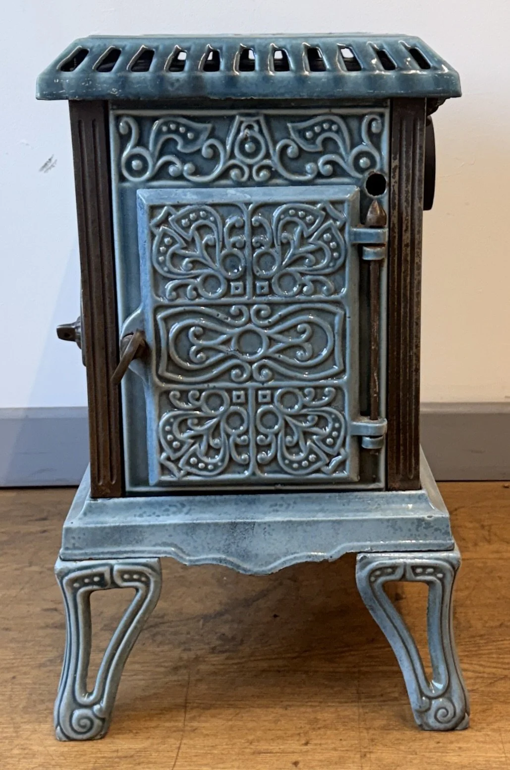Door view of French cast iron stove