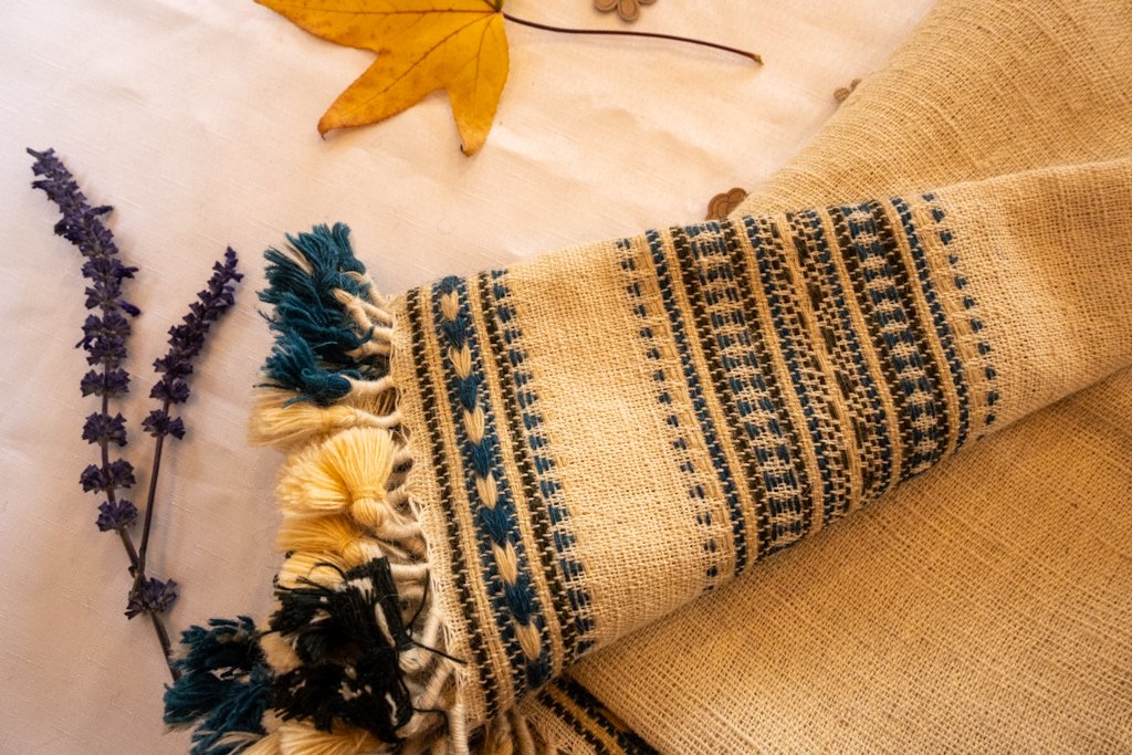 Handwoven Bhujodi Wool Throw – Natural Ivory with Indigo Stripes & Tassels