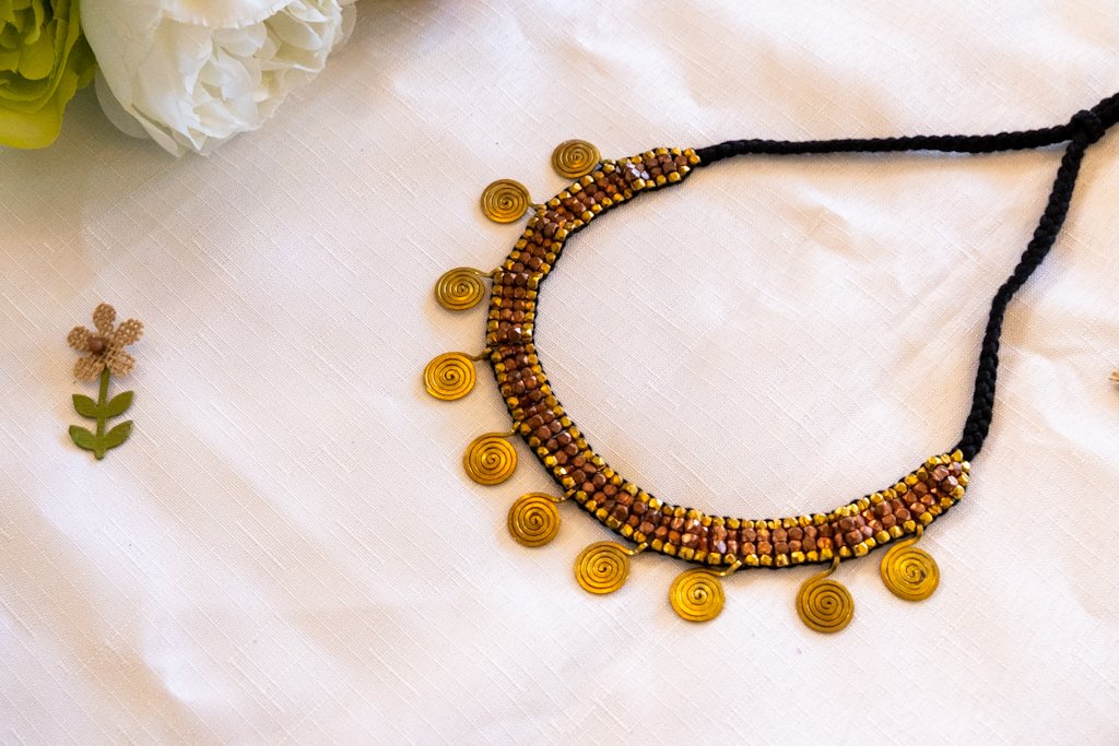 Handmade Dhokra Spiral Disc Necklace – Brass Beads on Black Cord