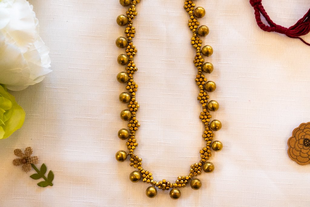 Handmade Dhokra Brass Ball Necklace – Woven Maroon Cord