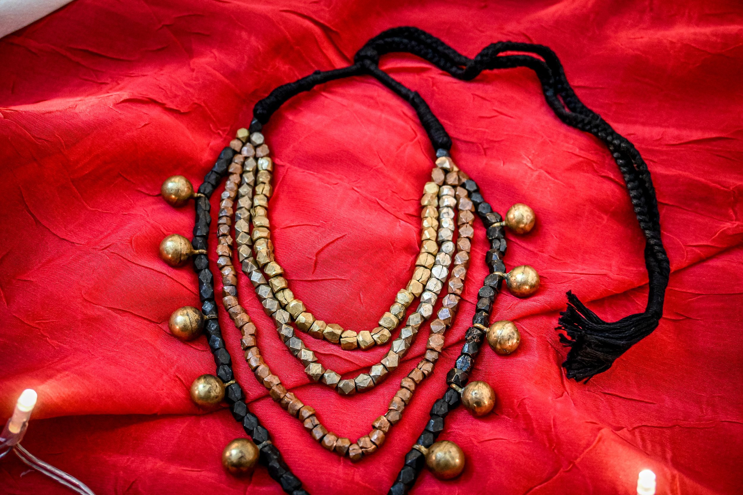 Handmade Dhokra Layered Brass Ball Necklace – Black Woven Cord