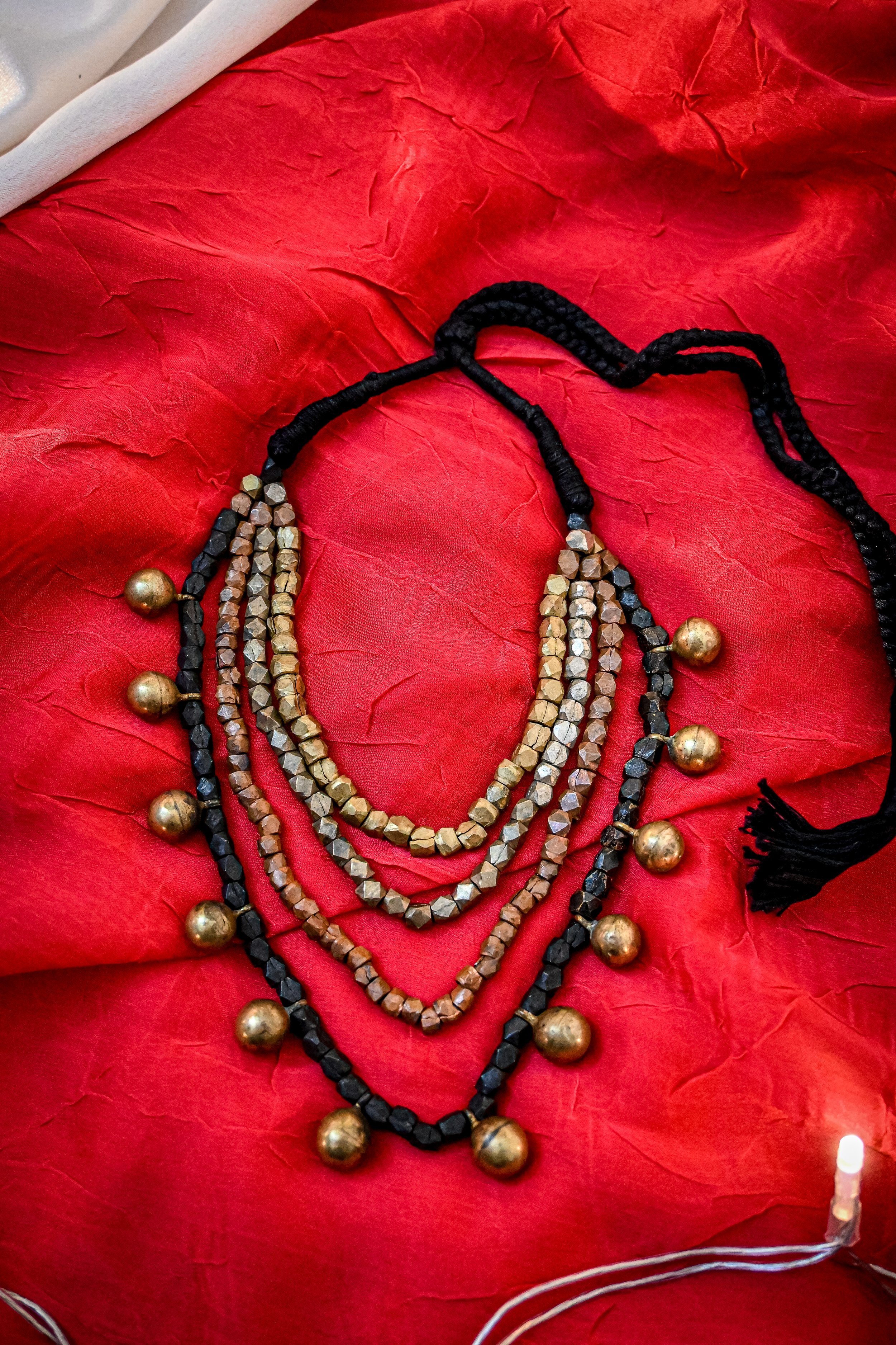 Handmade Dhokra Layered Brass Ball Necklace – Black Woven Cord