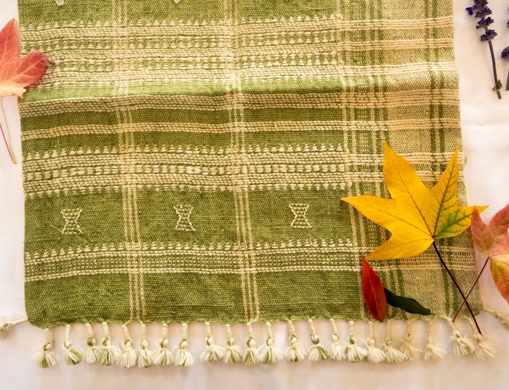 Handwoven Bhujodi Wool Cushion Cover – Sage Green with Ivory Motifs & Tassels