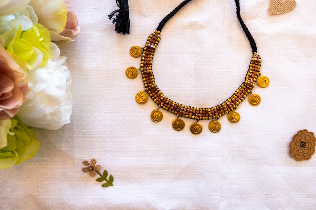 Handmade Dhokra Spiral Disc Necklace – Brass Beads on Black Cord