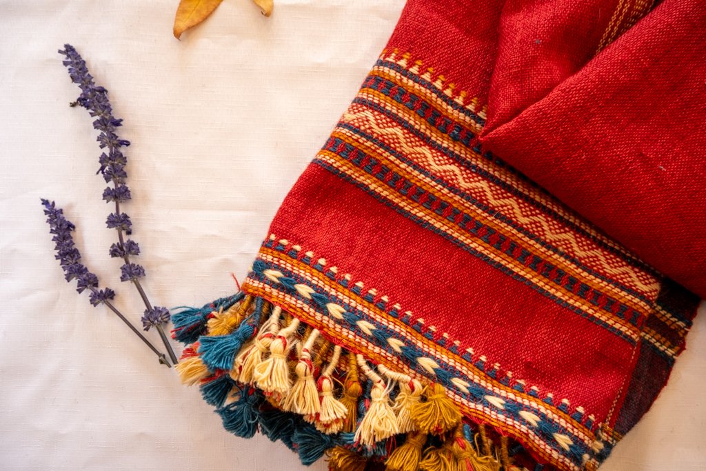 Handwoven Bhujodi Wool Throw – Deep Red with Multicolour Kutch Motifs & Tassels