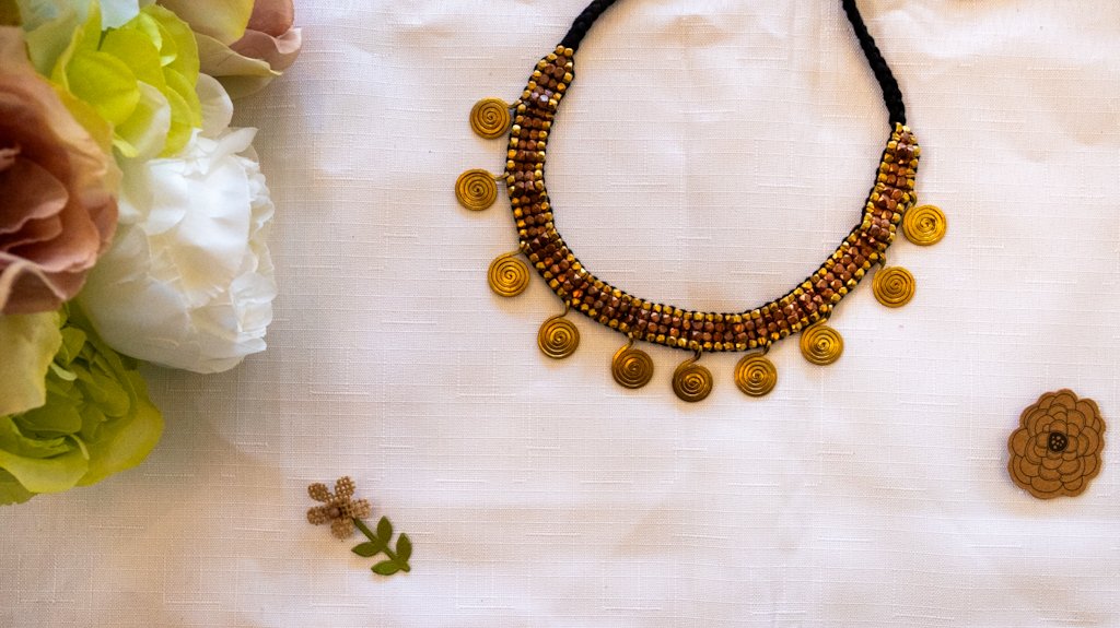 Handmade Dhokra Spiral Disc Necklace – Brass Beads on Black Cord