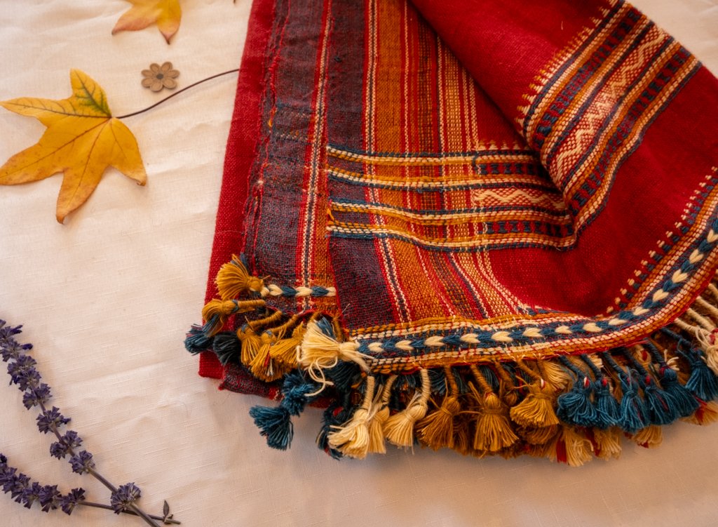 Handwoven Bhujodi Wool Throw – Deep Red with Multicolour Kutch Motifs & Tassels