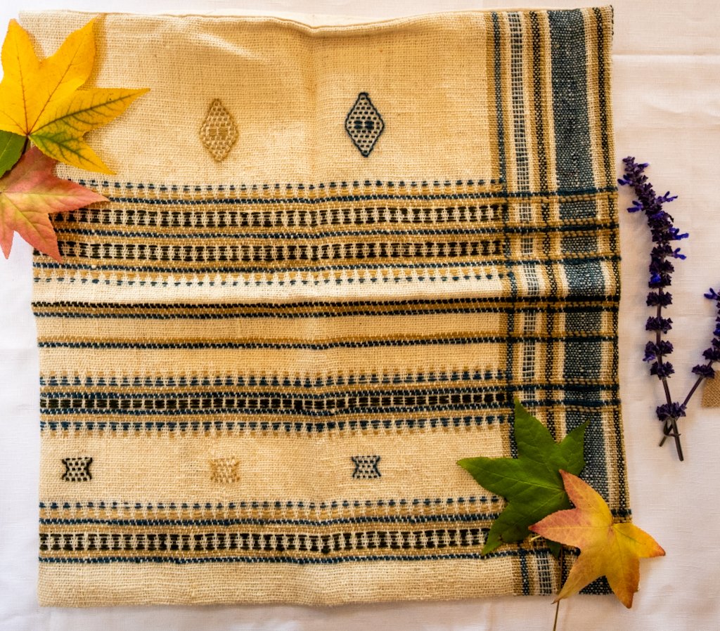 Handwoven Bhujodi Wool Cushion Cover – Natural Ivory with Indigo & Mustard Motifs