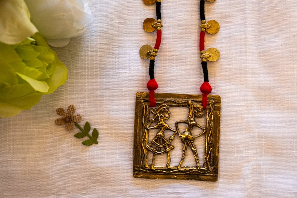 Handmade Dhokra Dance Motif Necklace – Brass Pendant with Red-Black Cord