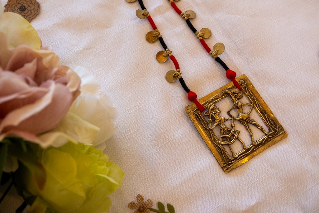 Handmade Dhokra Dance Motif Necklace – Brass Pendant with Red-Black Cord
