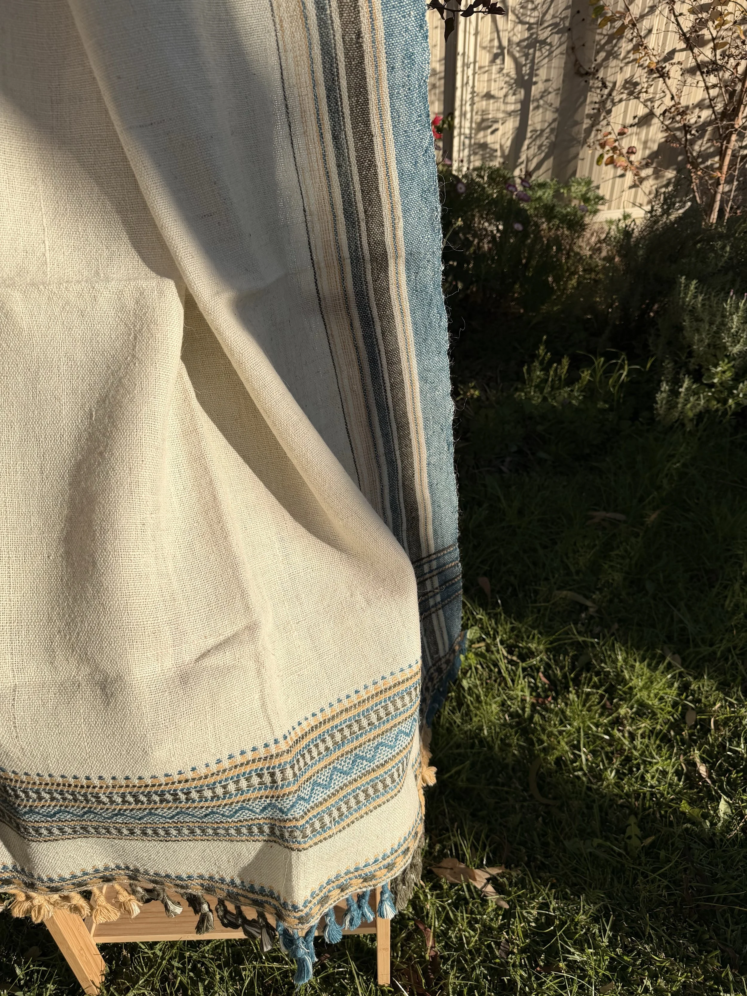 Handwoven Bhujodi Wool Throw Natural Ivory with Indigo Stripes Tassels