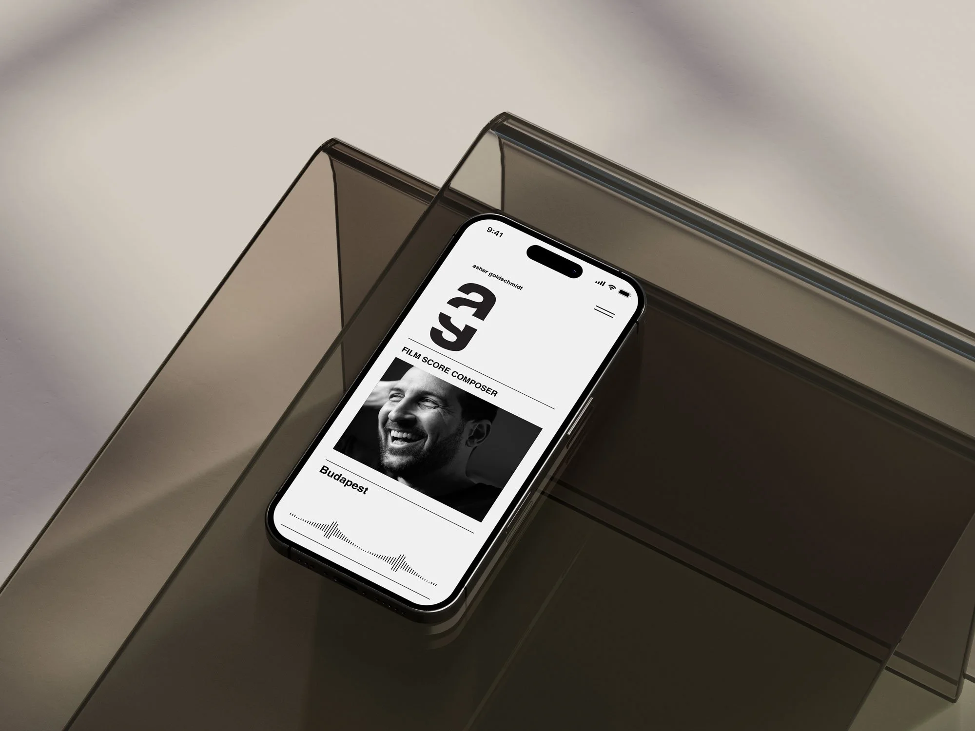 Smartphone with a film score app on a reflective surface