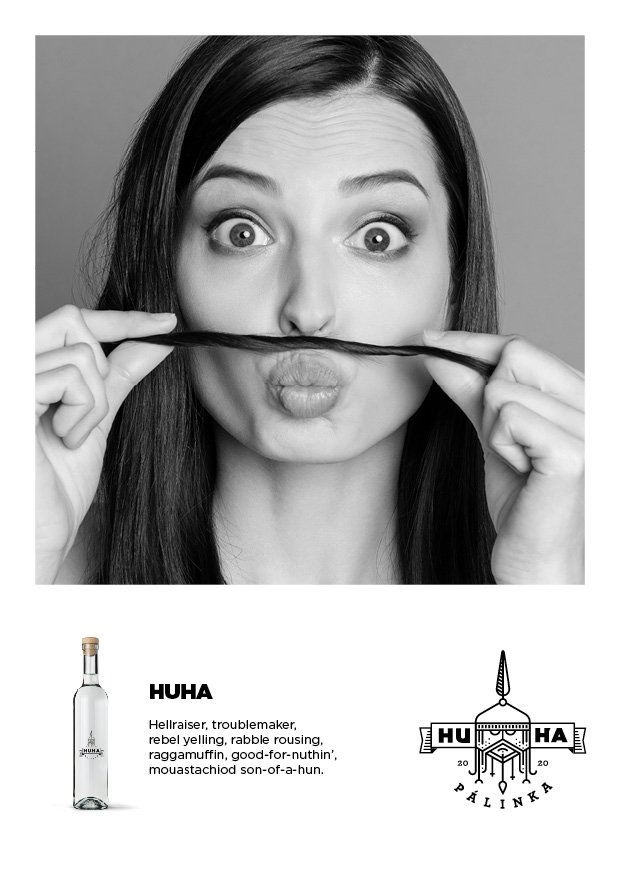 Black and white image of a woman making a fake mustache with her hair, puckering her lips. Below is a bottle labeled 'HUHA Palinka' with text describing it as a spirited, rebellious beverage.