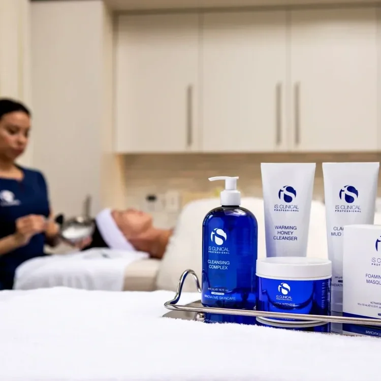 Client receiving an iS Clinical or NeoLifting® facial treatment for healthy, radiant skin at YourSkinRN Waterloo..